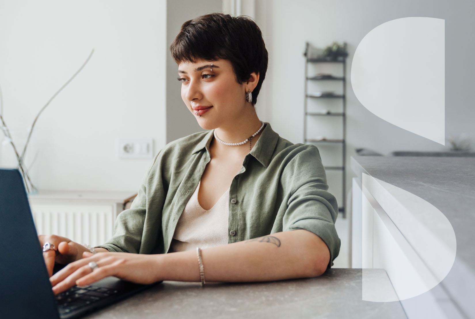 a professional adult woman using a laptop