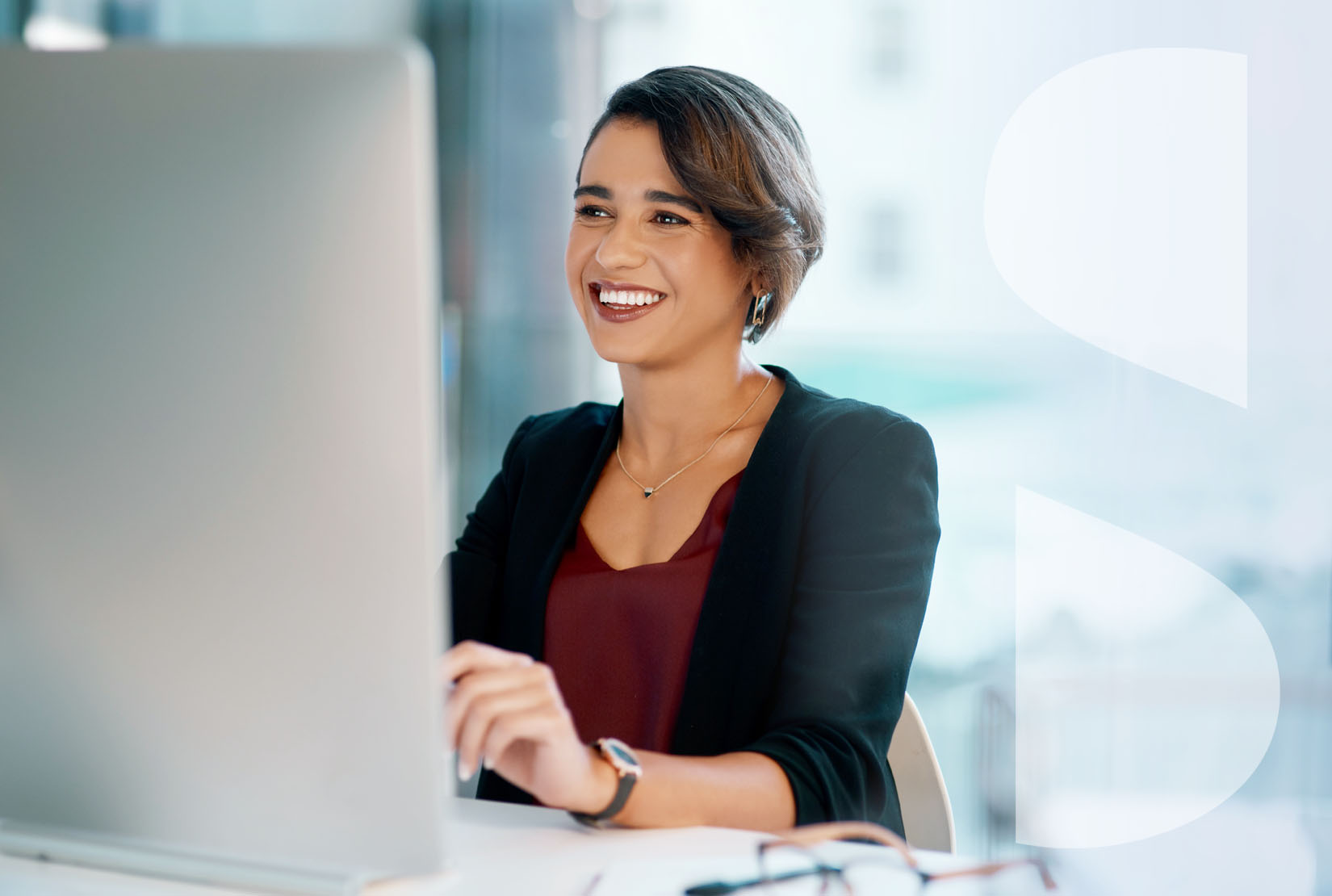 a professional adult woman using a laptop